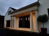 TRANSFORMING MODERN HOMES WITH A PORTICO