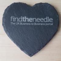 Heart-shaped Find The Needle slate coasters produced by Sheffield Lasers