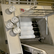 Reducing bakery flour dusting costs and problems