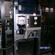 Acmi Palatizer fitted with state of the art Automatic Grease Lubrication System
