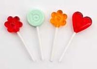 Innovative shaped and embossed lollipops