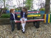 Pupils buy a Buddy Bench to promote friendship and caring at Titchfield Primary School.