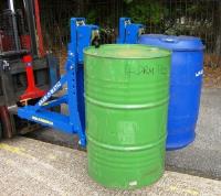 Using fork lift drum handling attachments to remove drums quickly and safely from containers or lorries