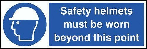 Safety helmets must be worn beyond this point