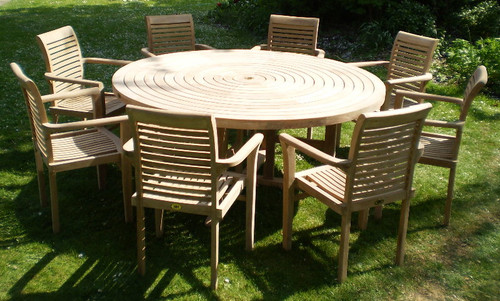 Providers of Turnworth Teak 180cm Round Ring Table Set with Lovina Stacking Chairs UK