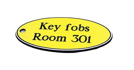 50x100mm Key fob oval - Black text on yellow