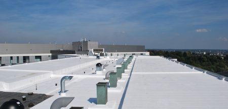 USING COOL ROOFS TO REDUCE ENERGY COSTS AND HEAT ISLANDS