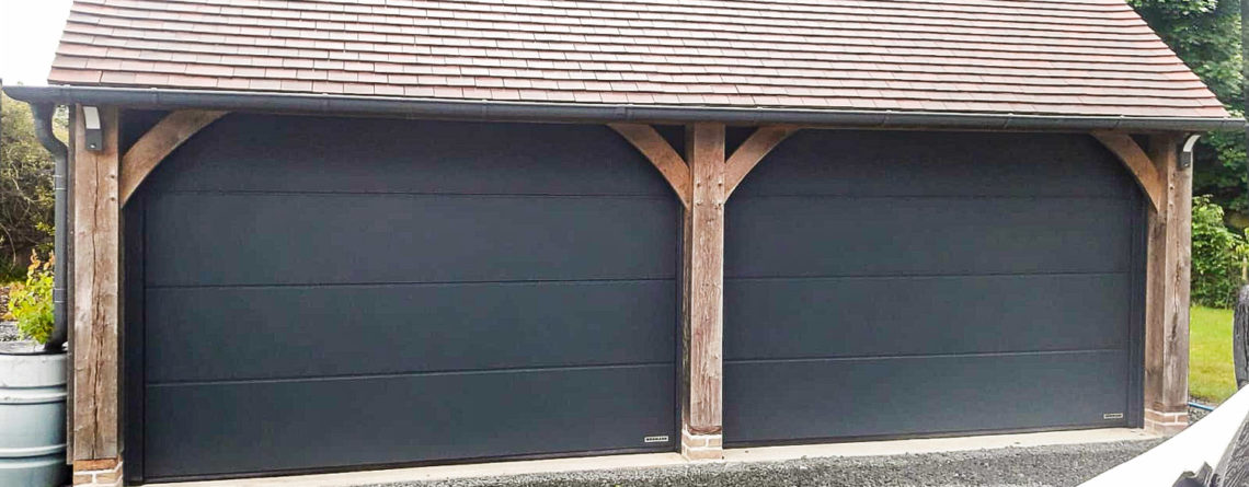 Pair of Hormann LPU42 L-Ribbed Insulated Sectional Garage Doors in Anthracite