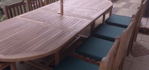 Providers of Oval Teak Extending Double Leaf Table Set with Southwold Chairs