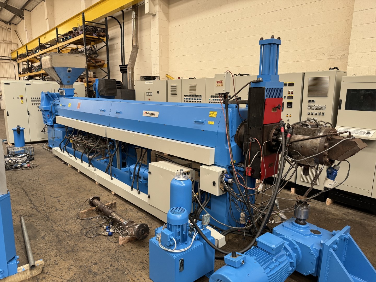 UK Suppliers Of 2440mm wide Davis Standard sheet extrusion line with 150mm DS extruder, D vented, die, 2440mm wide J type calender, edge trim haul off guilotine 1996