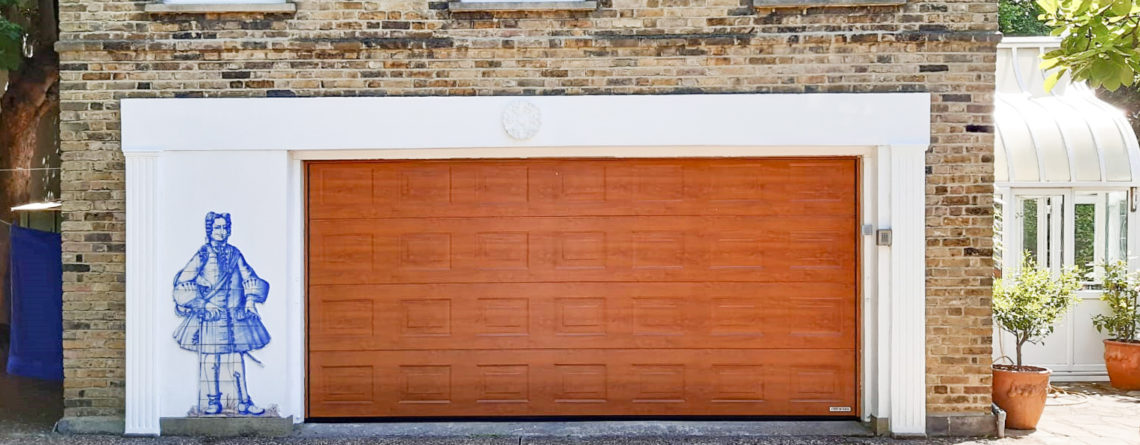Hormann LPU42 Georgian Insulated Sectional Garage Doors in Golden Oak