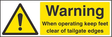 Warning when operating keep feet clear of tailgate edges