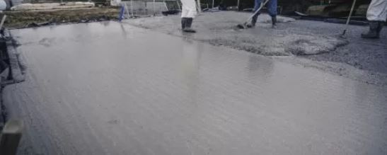 What is screed and how does it differ from standard concrete?