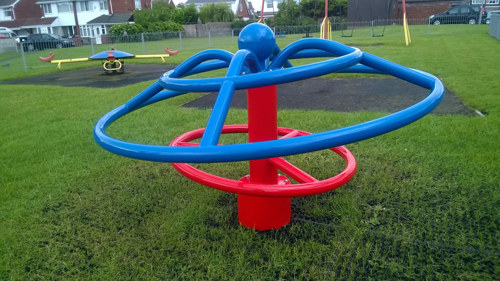 UK Designers Of Powder Coated Metal Playground Roundabouts