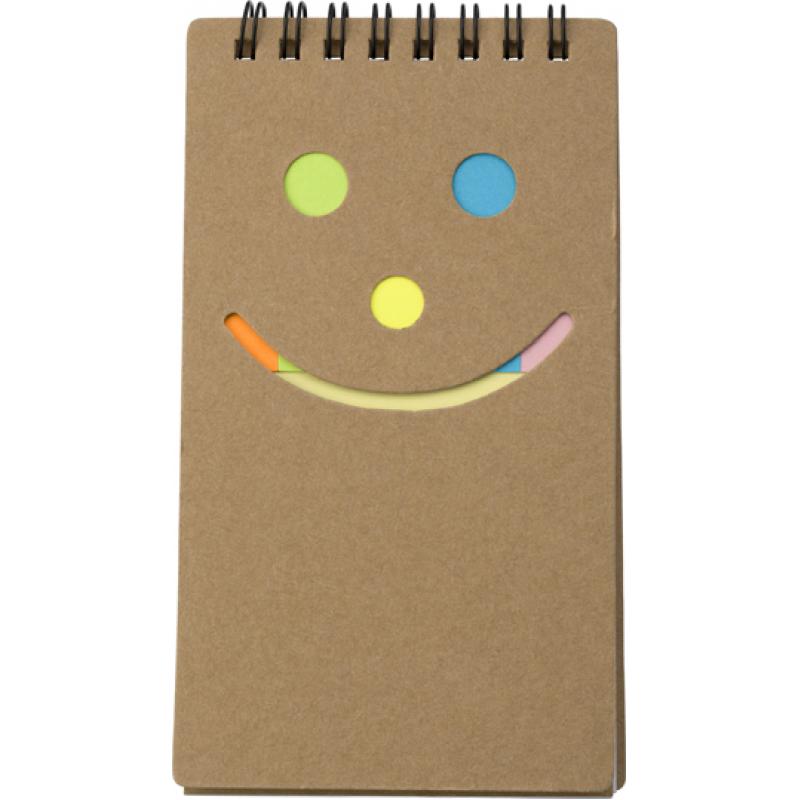 Notebook with sticky notes.