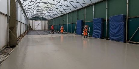 SEAMLESS UPGRADE HYDE CRICKET CLUBS IMPROVED TRAINING GROUND WITH CLOCKWORK SCREEDS LIQUID FLOOR TECHNOLOGY
