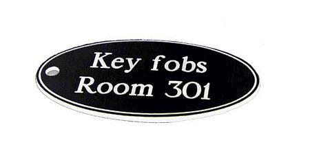 50x100mm Key fob oval - White text on black