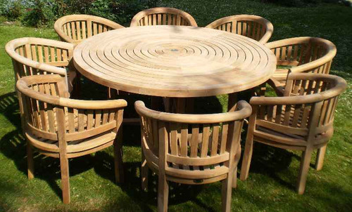 Providers of Turnworth Teak 180cm Round Ring Table Set with Banana Arm Chairs UK