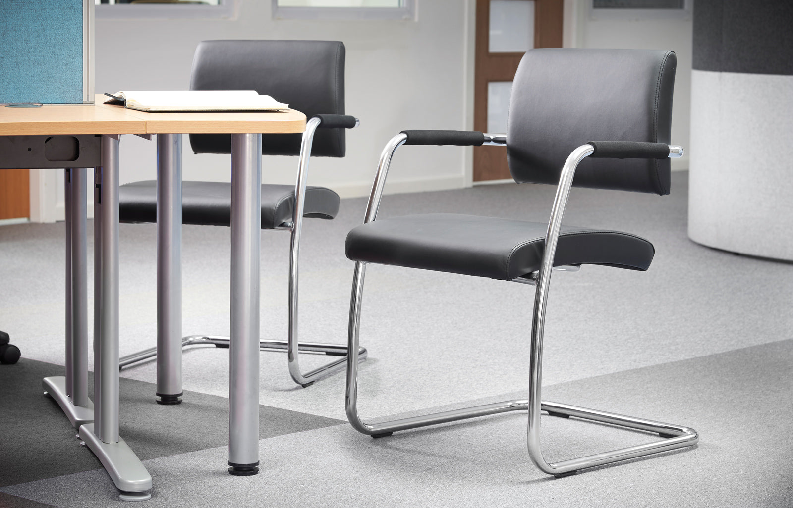 Suppliers Of Bruge Black Faux Leather Conference Cantilever Visitor Chair - Sold in Packs of Two North Yourkshire