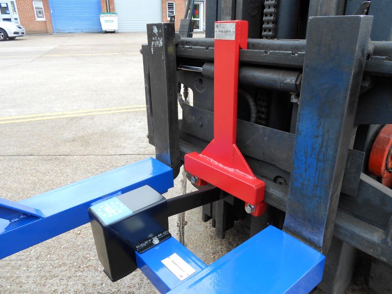 Made to measure drum handling forklift attachments