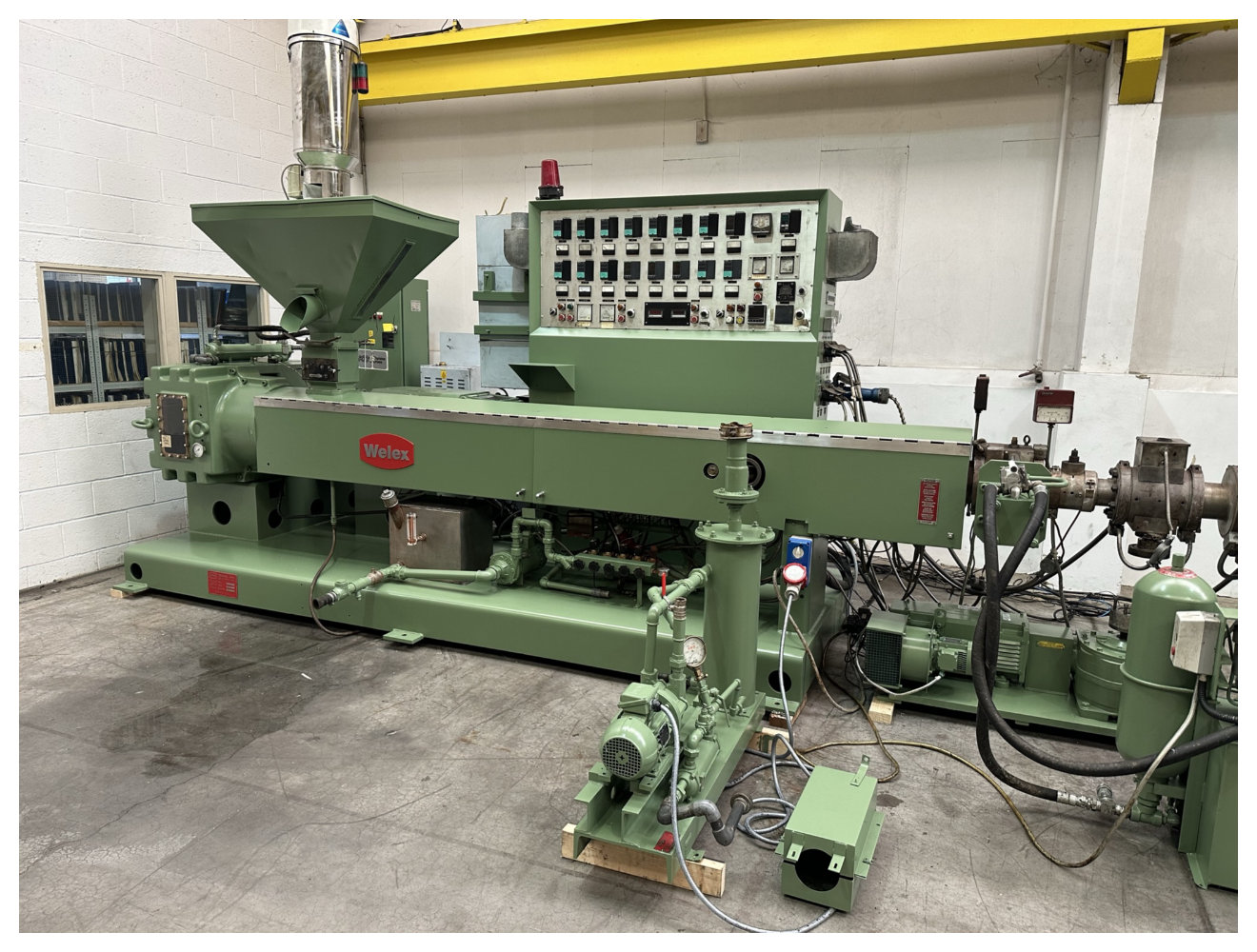 UK Suppliers Of 1040mm Welex coextrusion sheet line with 120mm primary extruder, gear pump, 1040mm x 450mm 3 roll stack, puimps, haul off 2 station winder.