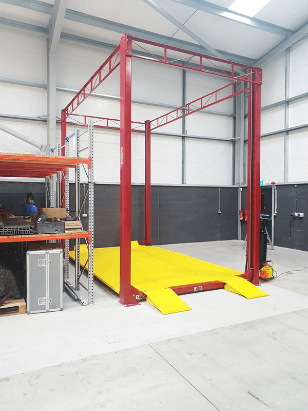 Mezzanine Height 4 Post Vehicle Lift for Garages Looking to Increase Workshop Space and Storage Capacity