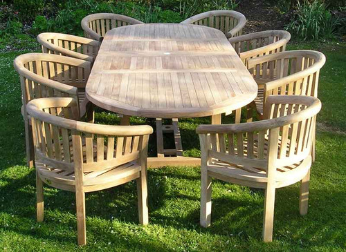 Suppliers of Oval Teak Table Set Extending Double Leaf with Banana Arm Chairs UK