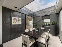 Bespoke Sliding Rooflight Installed In Penthouse Suite