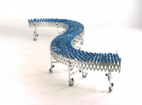 British Made Flexible Extending Skate Wheel Conveyor For Recycling Applications