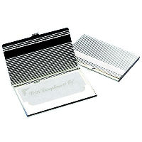 RIBBED SILVER PLATED METAL BUSINESS CARD OR CREDIT CARD CASE.