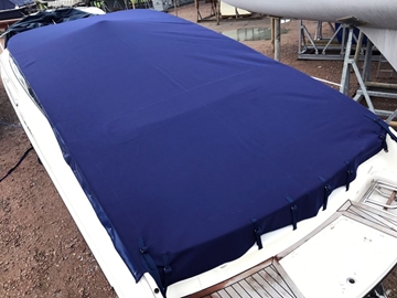 Manufacture Of Tonneau Covers For Powerboat Protection From All Weather Conditions