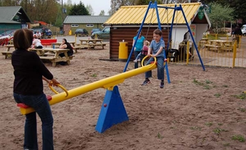 Designers Of Traditional Playground Seesaw