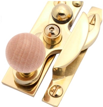 Wooden locking sash fastener