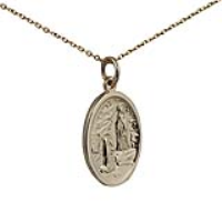 9ct Gold 21x15mm oval St Bernadette Pendant with a 1.2mm wide cable Chain