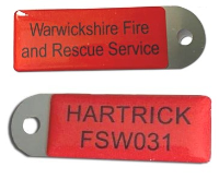 Rugged Metal Domed Name Tags for Fire and Rescue Warwickshire