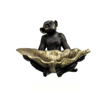 Sitting Monkey With Leaf
