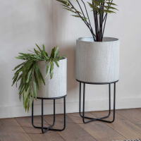 Cylindrical Shaped White Planter on Industrial Black Metal Stand Set of 2