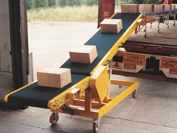 Powered Vehicle Loading/Unloading Conveyor Systems