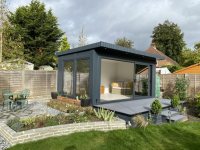 Contemporary Garden Summer House With Tri-Sliding Aluminium Doors