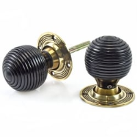 Ebony Beehive Door Knobs with Aged Brass Roses