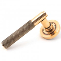 Brompton Sprung Lever Door Handle on Round Rose Set - Polished Bronze