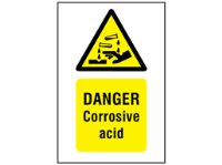 Danger corrosive acid symbol and text safety sign.