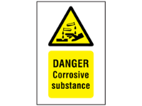 Danger corrosive substance symbol and text safety sign.