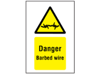 Danger barbed wire symbol and text sign.