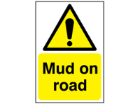 Mud on road warning sign.