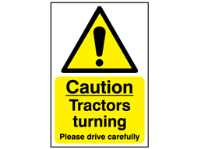 Caution, tractors turning, please drive carefully safety sign.