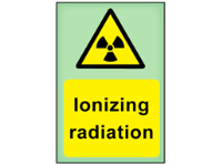 Ionizing radiation photoluminescent safety sign
