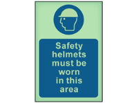 Safety helmets must be worn in this area photoluminescent safety sign