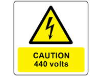 Caution 440 volts symbol and text safety label.