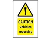 Caution Vehicles reversing symbol and text safety sign.